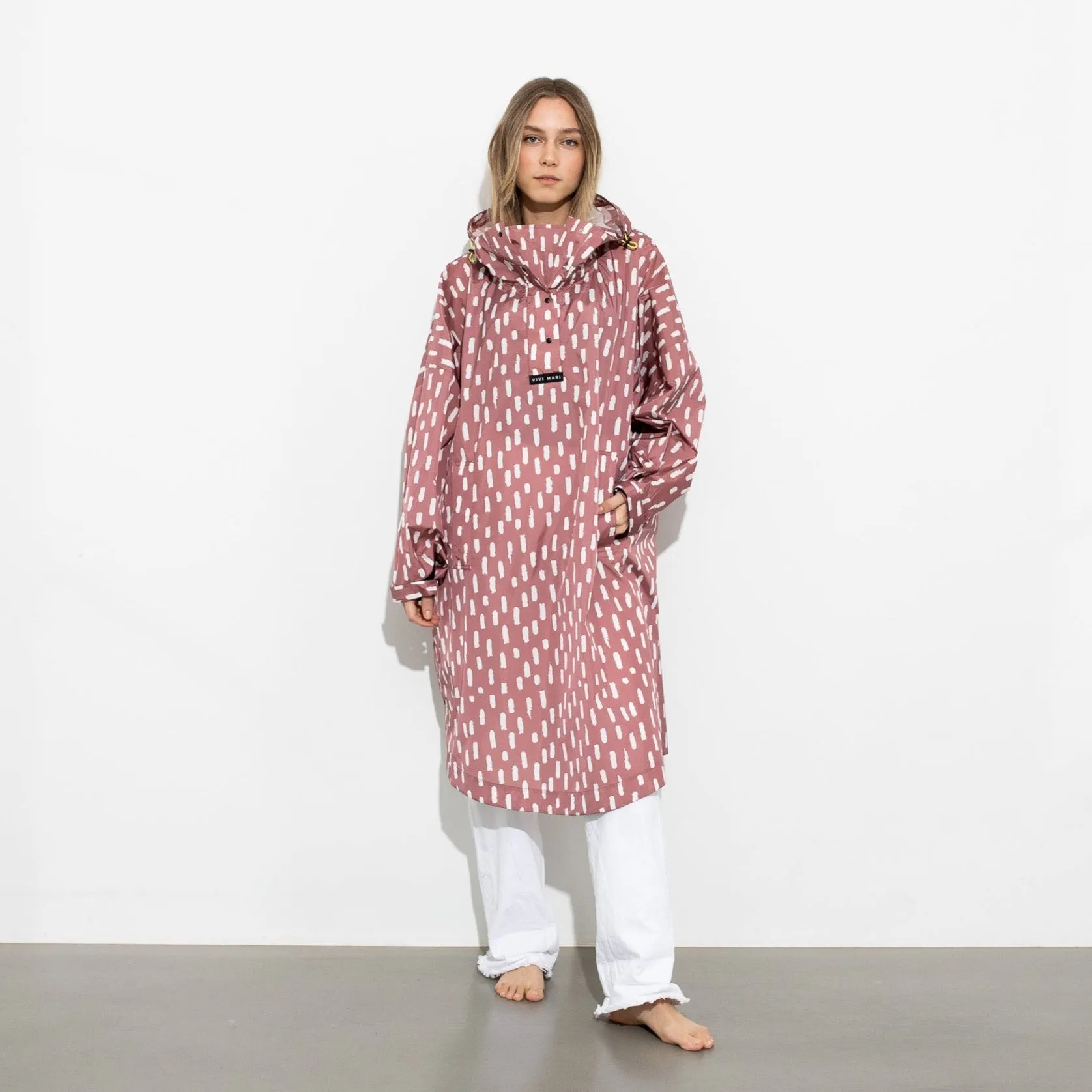 Raincoat drops mauve/white