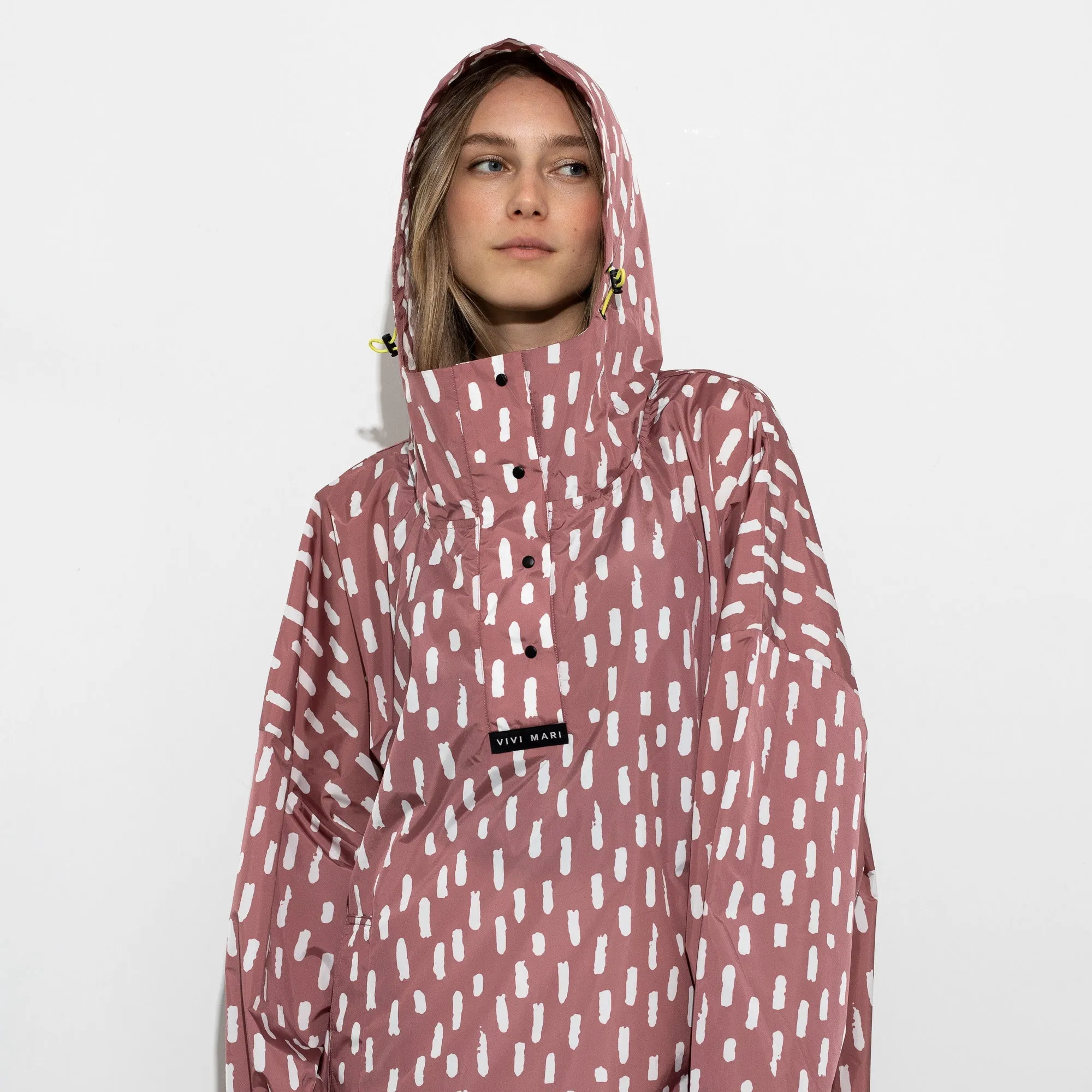 Raincoat drops mauve/white