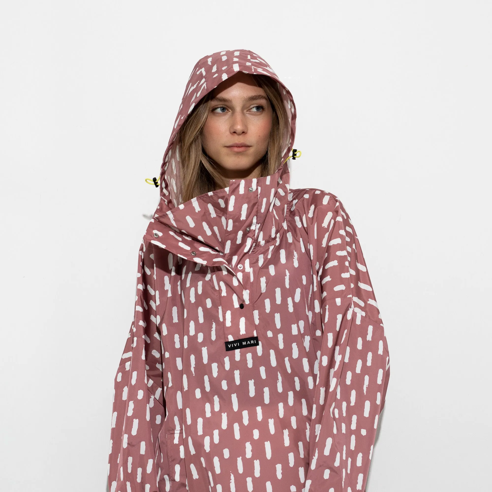 Raincoat drops mauve/white