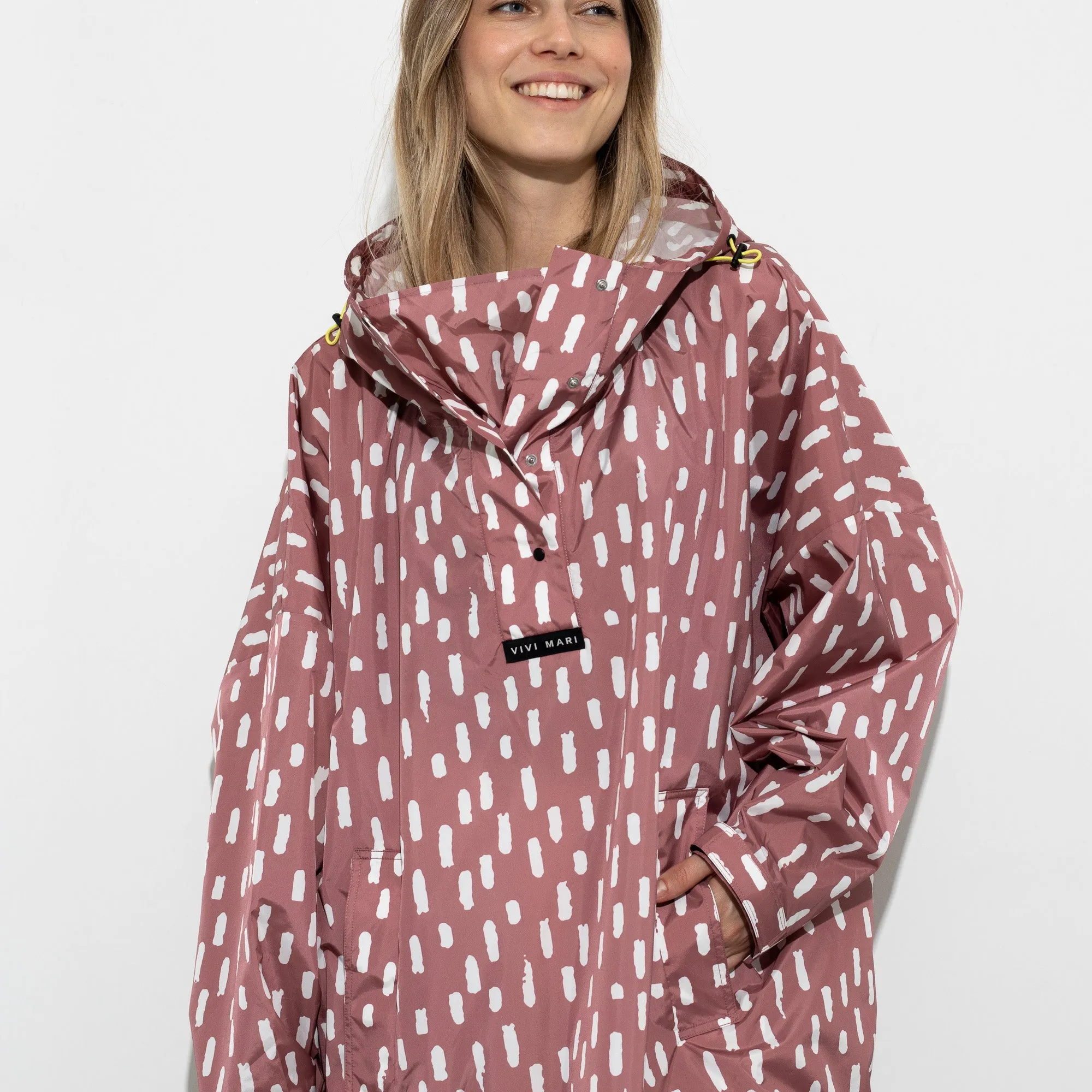 Raincoat drops mauve/white